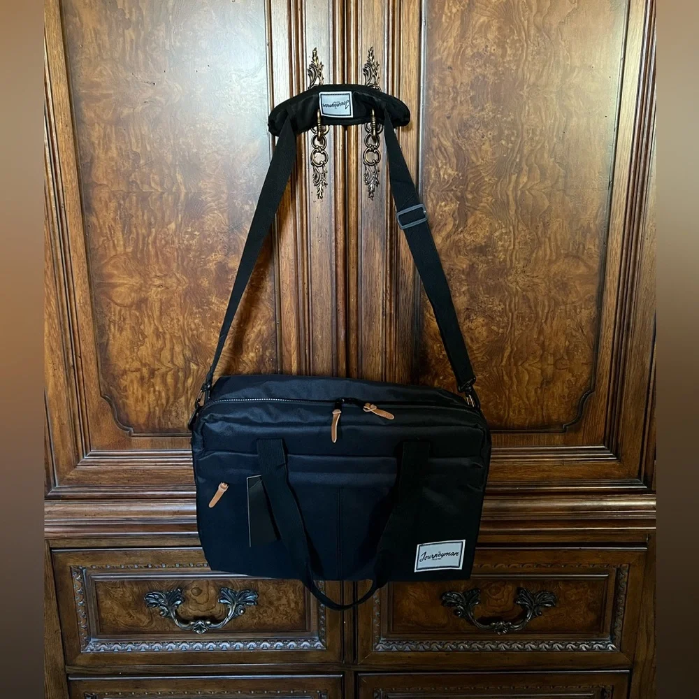 NWT The Journeyman Bag Co Duffle Bag in black with red mesh interior.